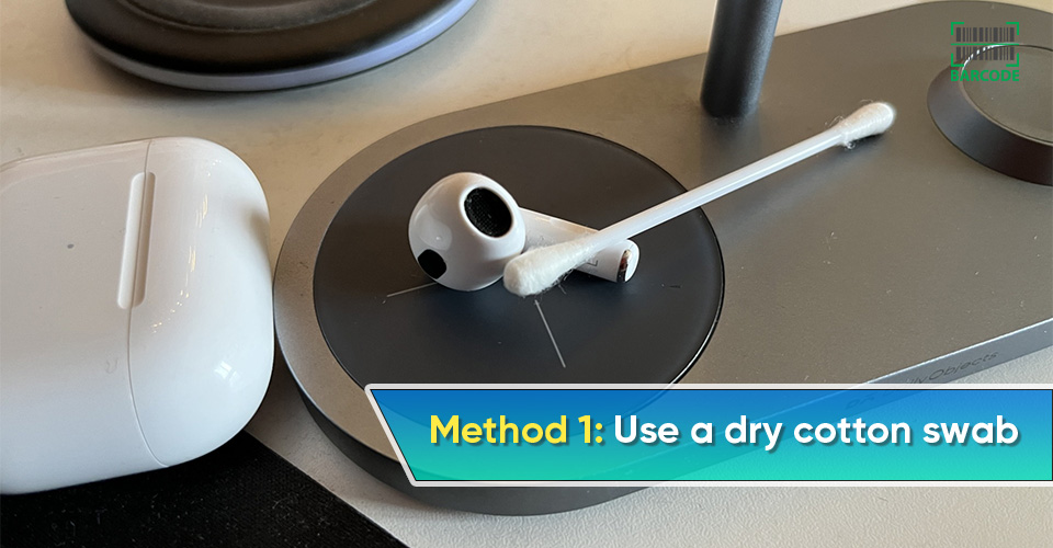You can use a dry cotton swab to clean microphone AirPods