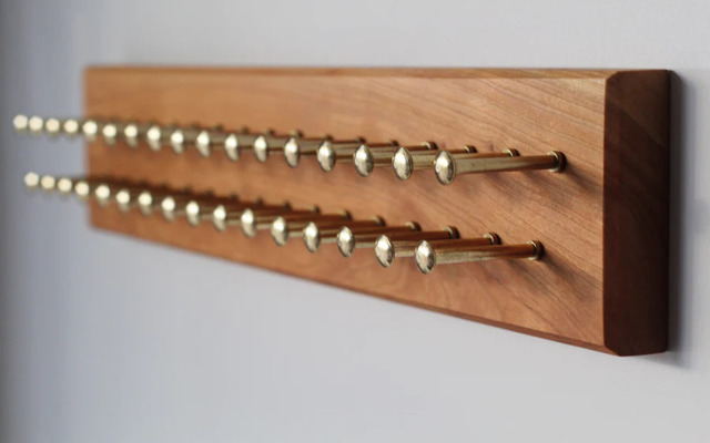 A wooden tie rack