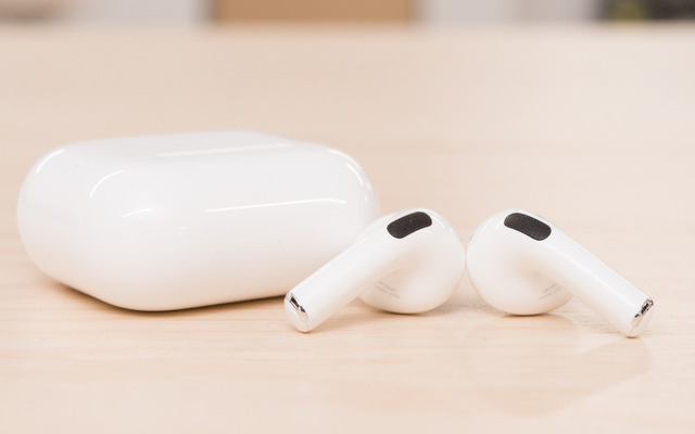 The Apple AirPods have a curved appearance 
